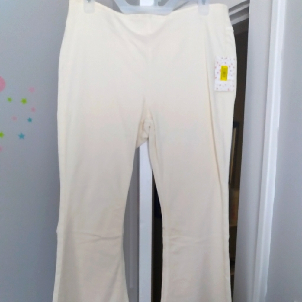 Cream colored long flair high waisted pants. Size 30